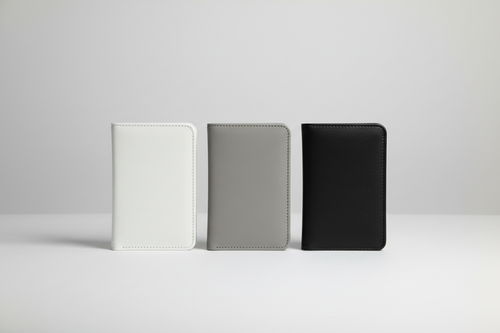 Passport holders in white gray and black