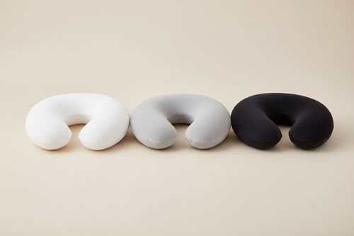 Travel neck pillows in white gray and black